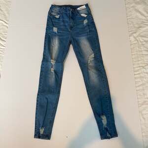 Women's High Rise Distressed Skinny Jeans